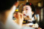 A modern geisha or maiko woman being prepared