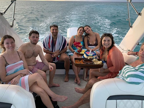 Group enjoying a private boat charter