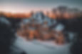 I need a drone shot of a mansion decorated for christmas from outside at dusk.jpg