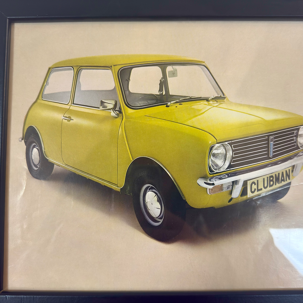 Thumbnail: Vintage framed car advertisement - yellow mini 