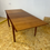 Thumbnail: Mid century teak Edmund Homa dining table