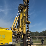 Close view of the mast and continuous-flight auger on a piling rig