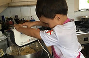 Cooking Pioneers. Chef using electric mixer. Cooking Lessons for Children based in Kent