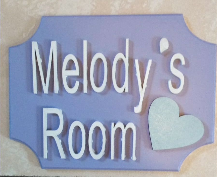Handmade personalised girls wooden name board with custom sayings or names