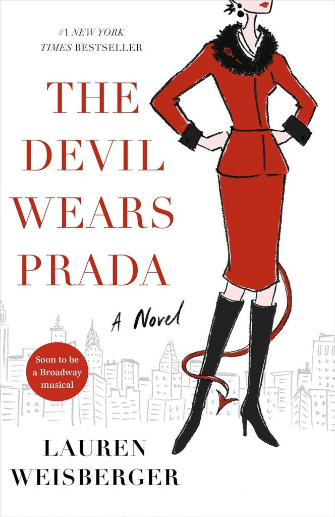 Front cover of "The Devil Wears Prada" by Lauren Weisberger. A line drawing of the NYC skyline against a plain white background. A woman in a red skirt suit with black fur trim and black high heeled boots stands with her hands on her hips. She wears red lipstick and has a devil's tail. Anne Hathaway The Devil Wears Prada film 2