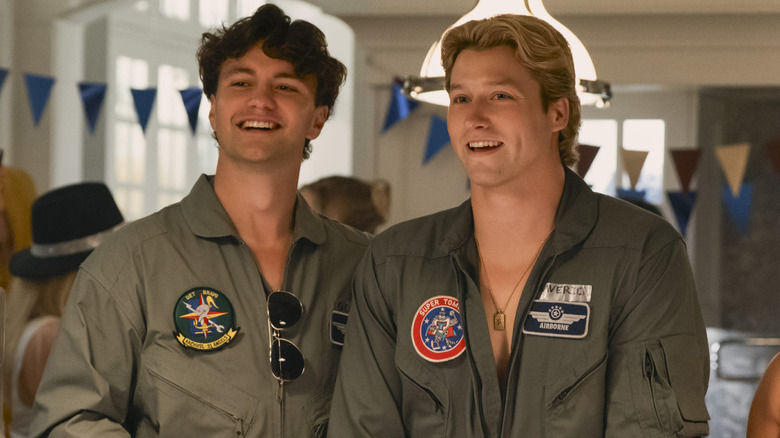 Beau and Dean dressed in aviator outfits at a party. They are both smiling. Amazon Prime The Deal Off Campus Briar University Deanallie