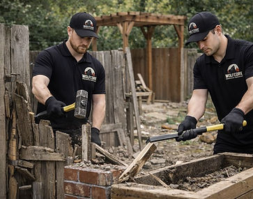 Workers demolishing and removing an outdoor pergola and landscaping structures from a residential property in Henderson, NV near MacDonald Ranch and Green Valley.