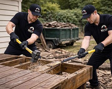 Workers dismantling a detached backyard deck during a light demolition and debris removal project in Henderson, NV serving Anthem, Inspirada, and surrounding neighborhoods.