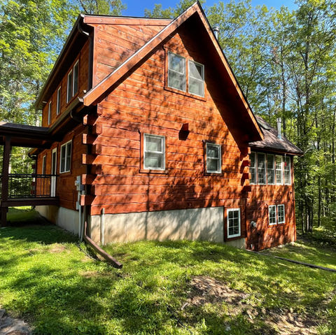 After - Wood Siding Cabin Stained