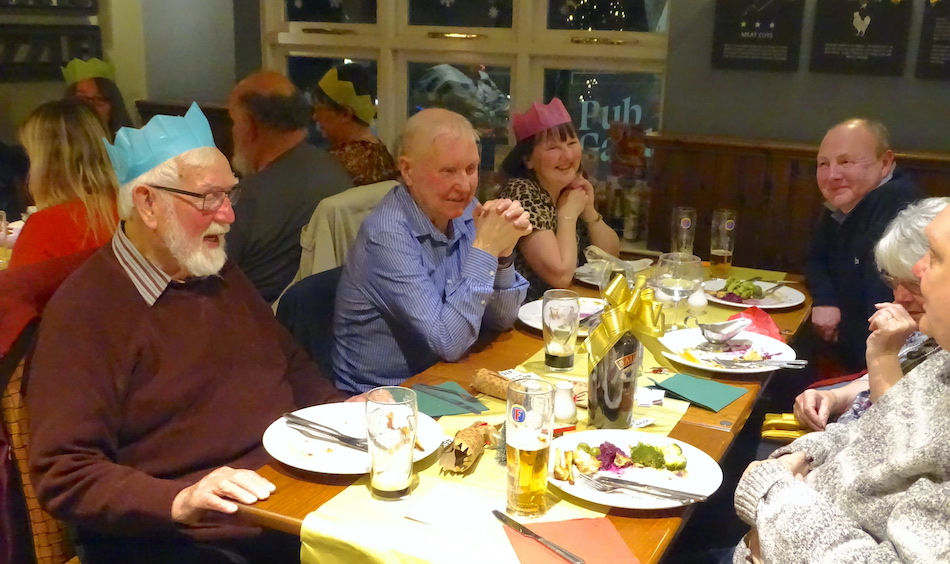 Brian, Phil and company at the Christmas dinner.