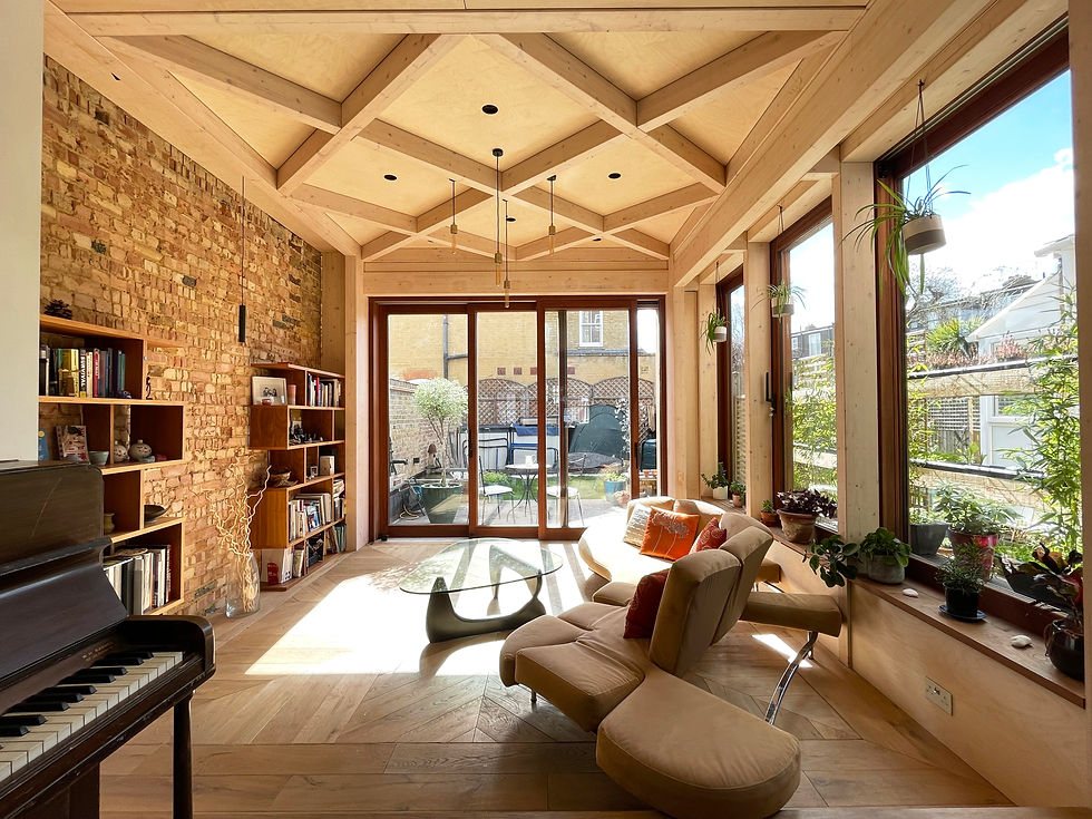 Living room revealing diagrid GLULAM beams on the ceiling