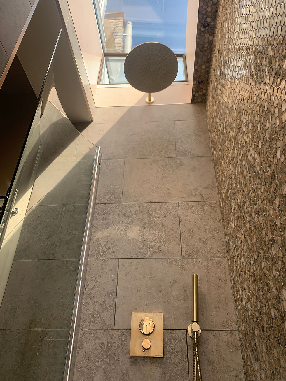 Bath area in the family bathroom opening up to the sky
