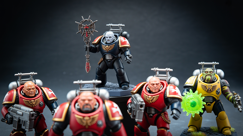 Studio showcase of beautifully painted Warhammer 40k 11th Edition miniatures including Blood Angels Jump Chaplain, Vanguard Veterans, and Ork Weirdboy