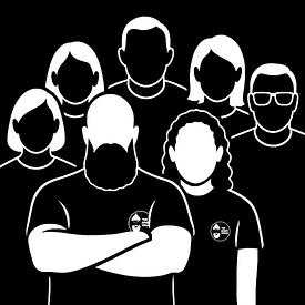 Group of men and women standing together with Liam and Fran at the front. Represents small group training sessions at the private gym – structured, focused, and friendly.