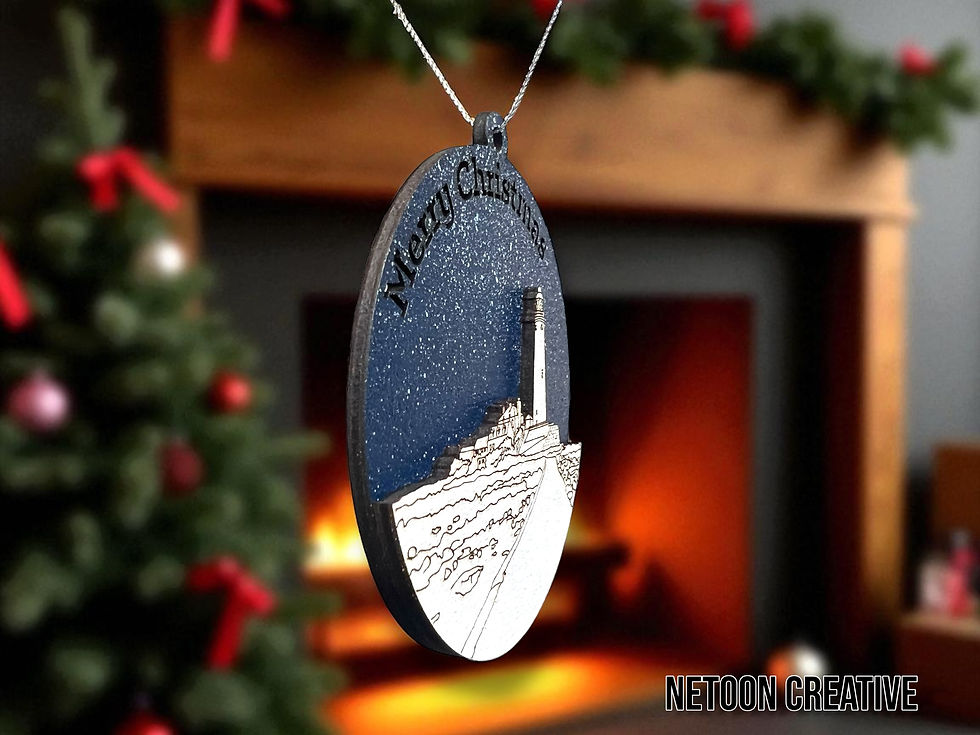 St Mary’s Lighthouse decoration hanging on a Christmas tree with gold thread loop.