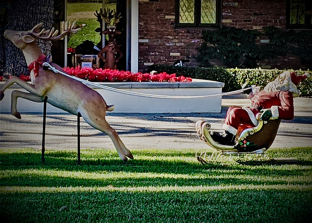 Santa and reindeer lawn decoration