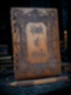 Engraved Book of Spells Front View