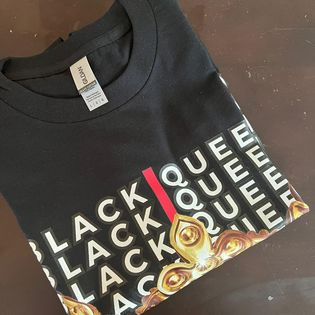 Black T-Shirt with "Black Queen" written in the background of a gold crown.