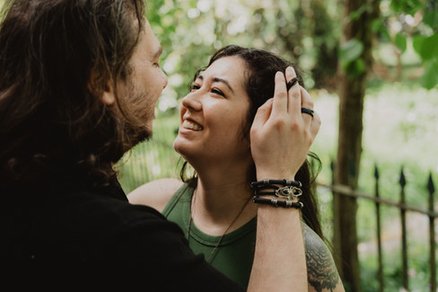 Couple walking together through gardens, staring into each others eyes| Bristol Wedding Photograoher