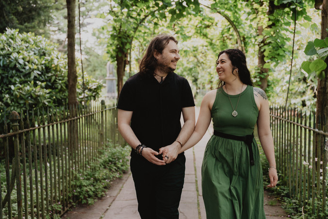 Couple walking together through gardens | Bristol Wedding Photograoher