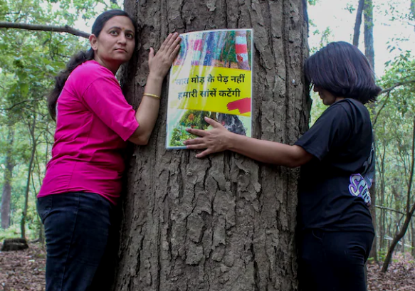 Locals stage a protest against the planned tree felling for the Rishikesh–Bhaniyawala highway widening project.