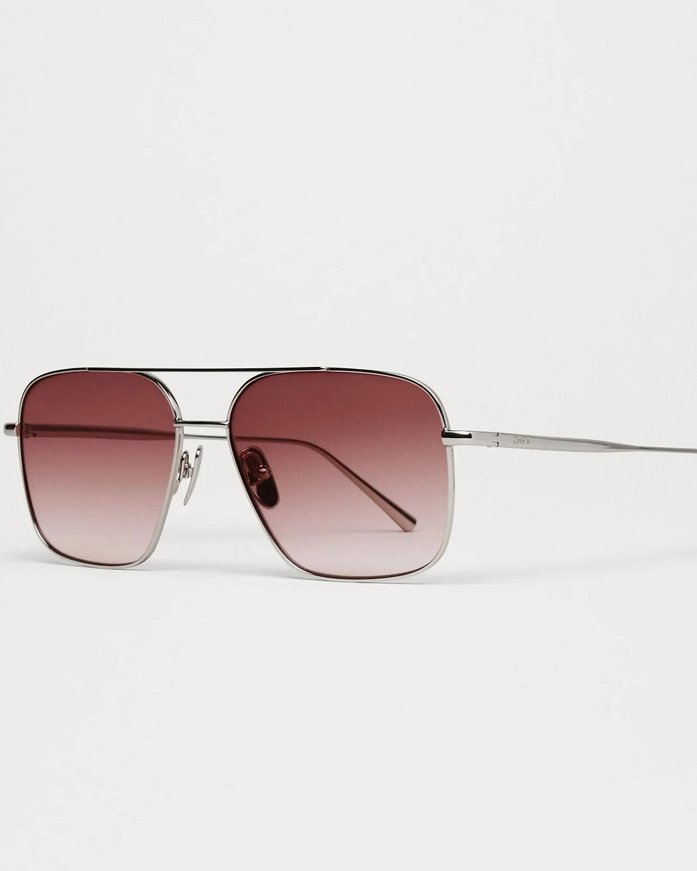 Thumbnail: Sunglasses with Steel Aviator Burgundy, metal frames and ombre lenses on white background.