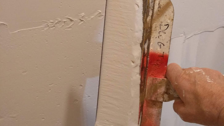 Spackling over drywall tape