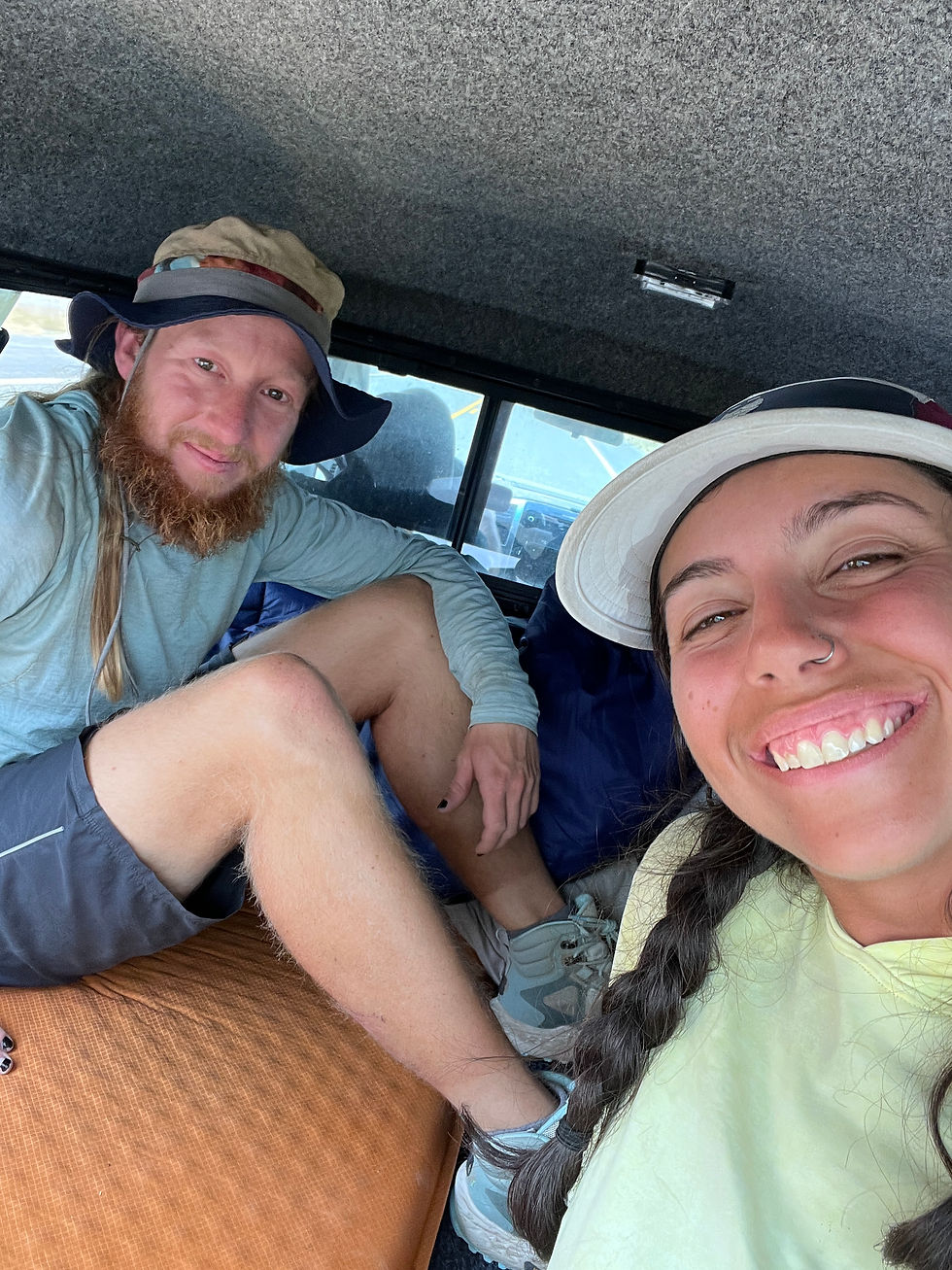 Just happy to be sitting inside, even if it was the cramped camper bed of a pickup