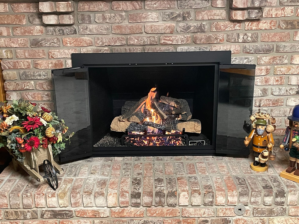 Brick fireplace with a burning log fire and mantel decorations