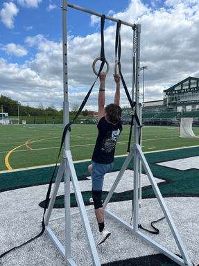 Athlete on the Flex Pole Vault Mobile Adjustable High Bar