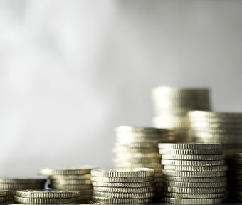 Stacks of Coins real estate services