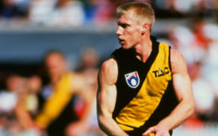 Matthew Knights looks for a teammate against the Swans.