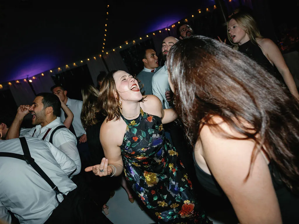 women dancing at wedding