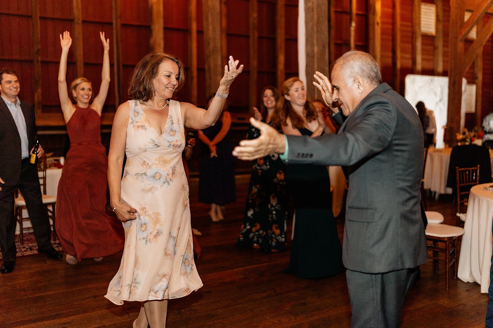 man and woman dancing at wedding