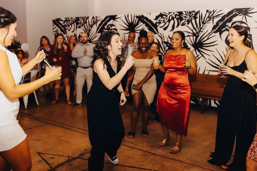 women dancing at wedding