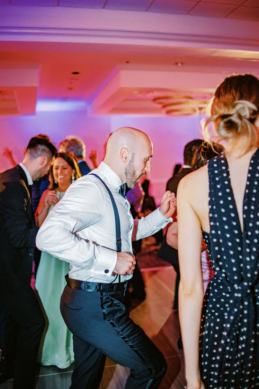 groomsman dancing at wedding