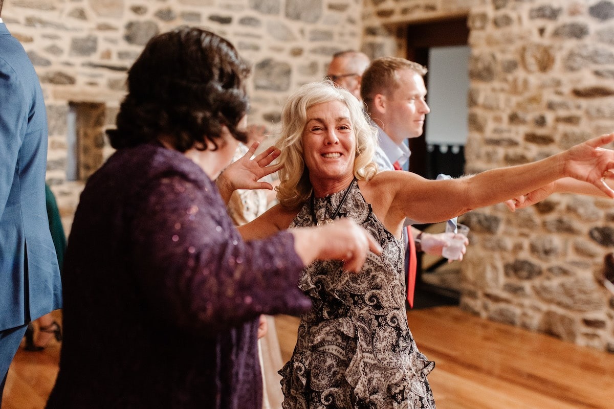 older women dancing at wedding