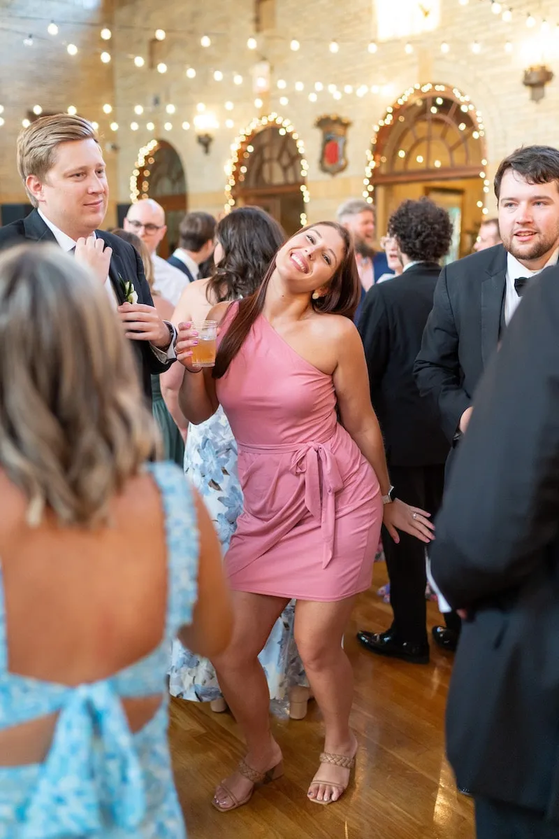 woman in pink dress dancing