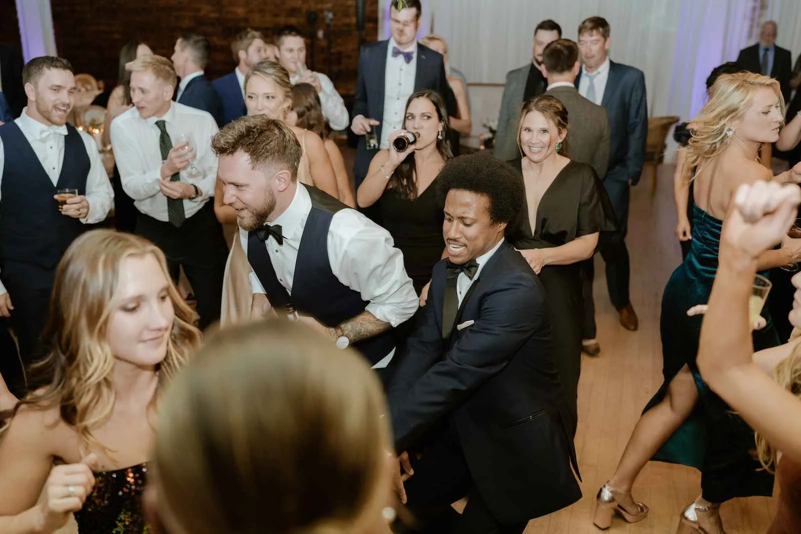 wedding guests dancing