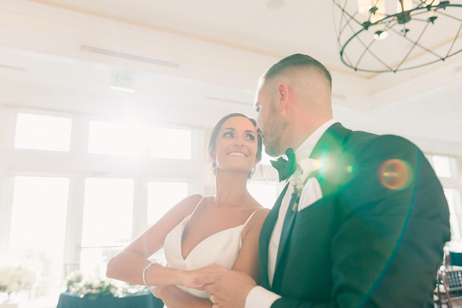 bride and groom practice first dance