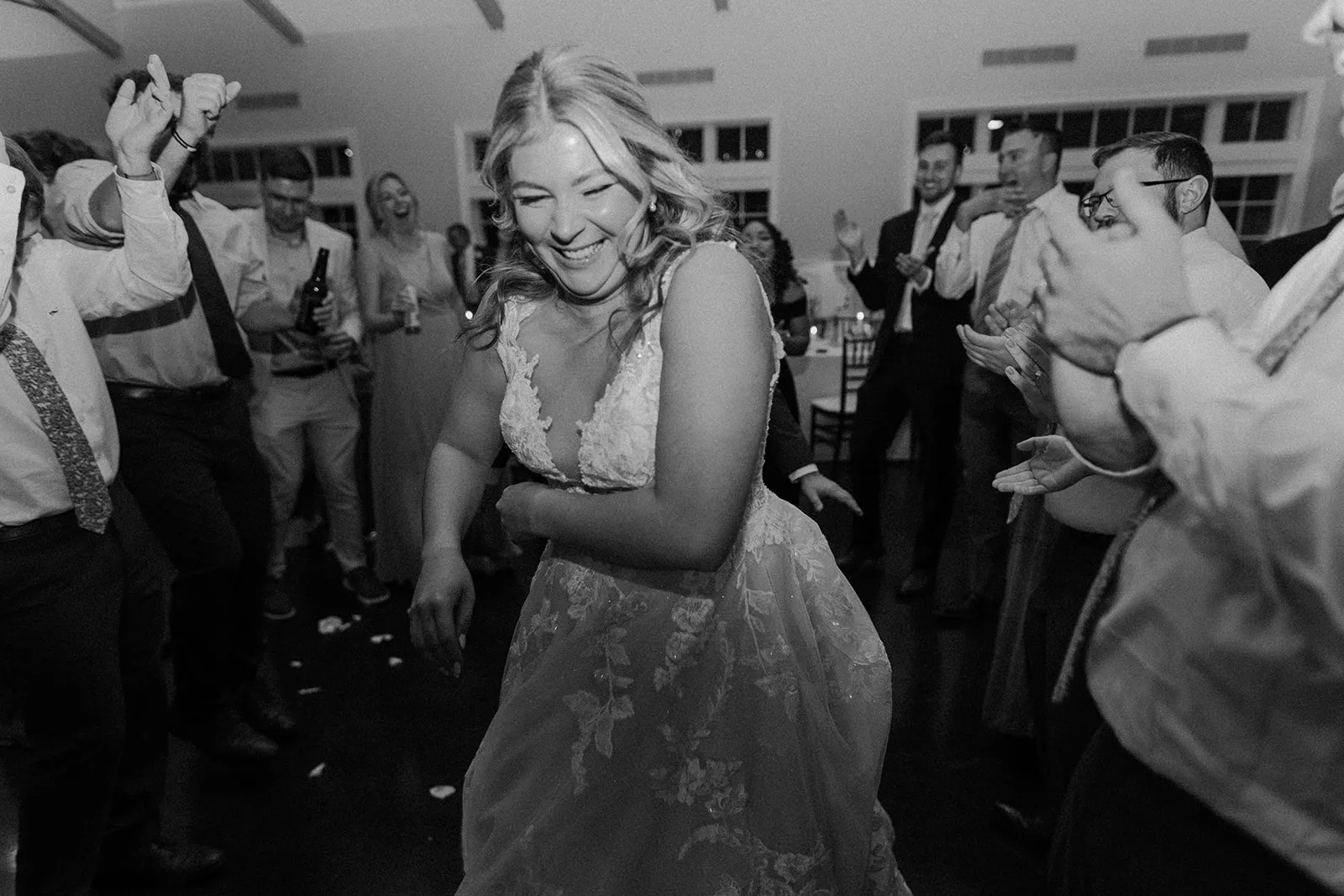 bride dancing and smiling