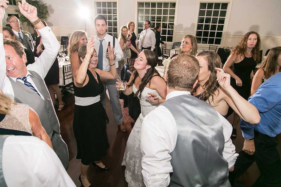 bride and guests dancing