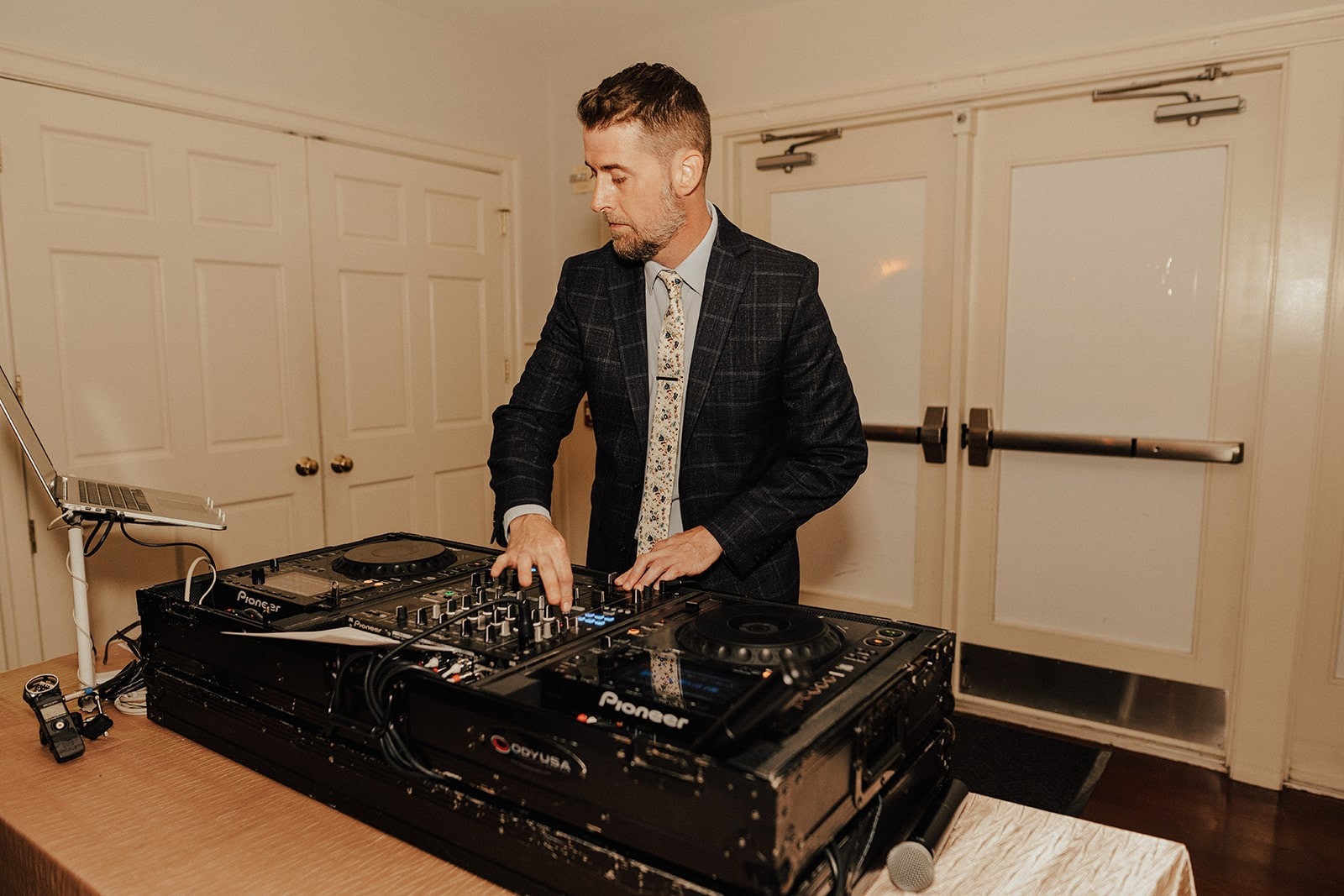 dj spinning music at wedding