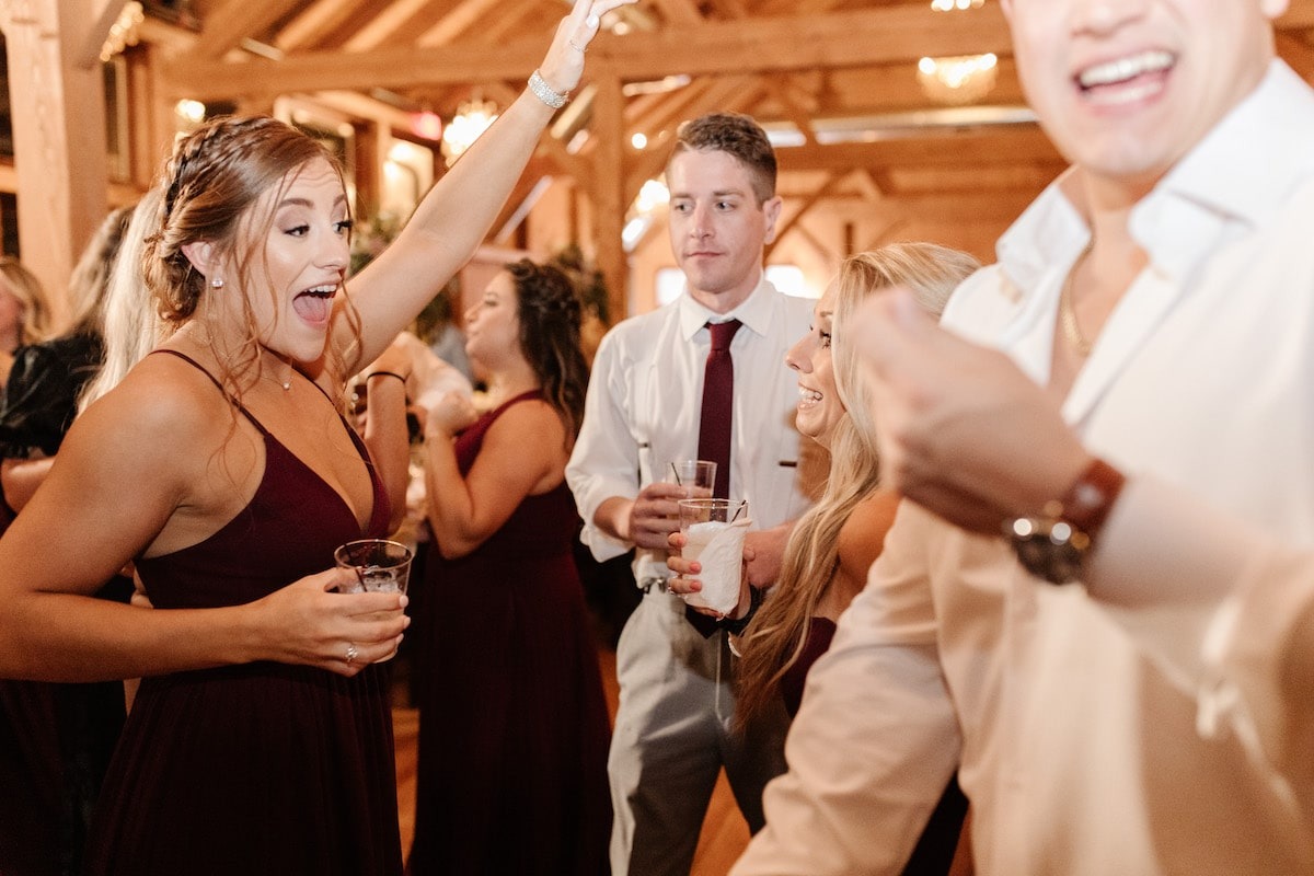 bridesmaid dancing with hand up