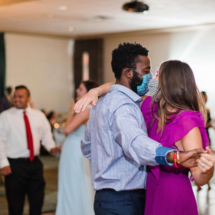 couple dances with masks on