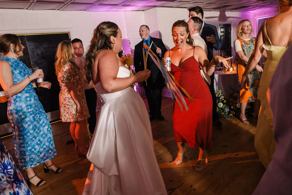 bride dancing with guests