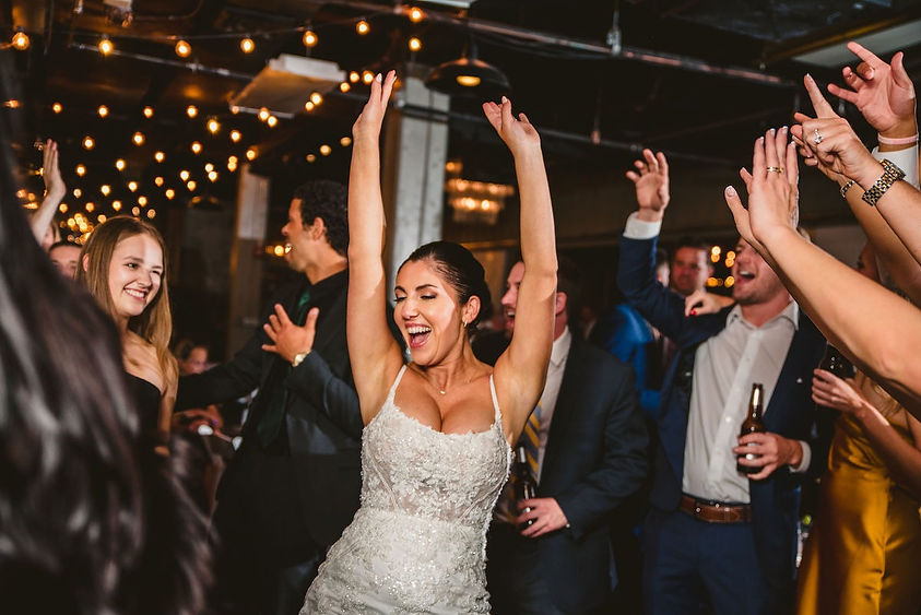 bride hands up - district remix maryland wedding djs ellicott city - main street ballroom