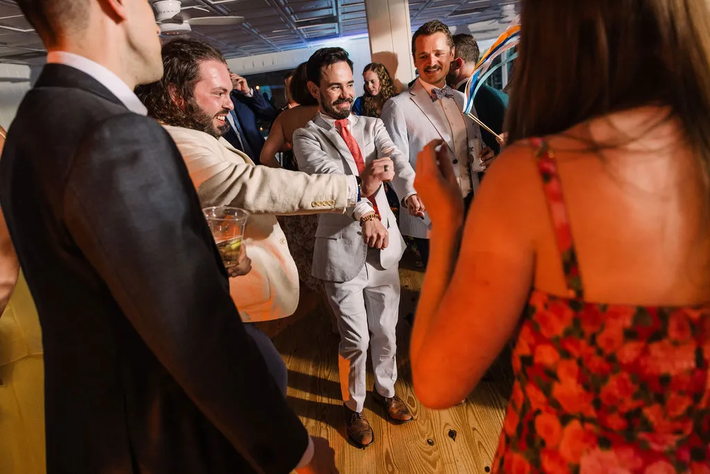 guys dancing at wedding