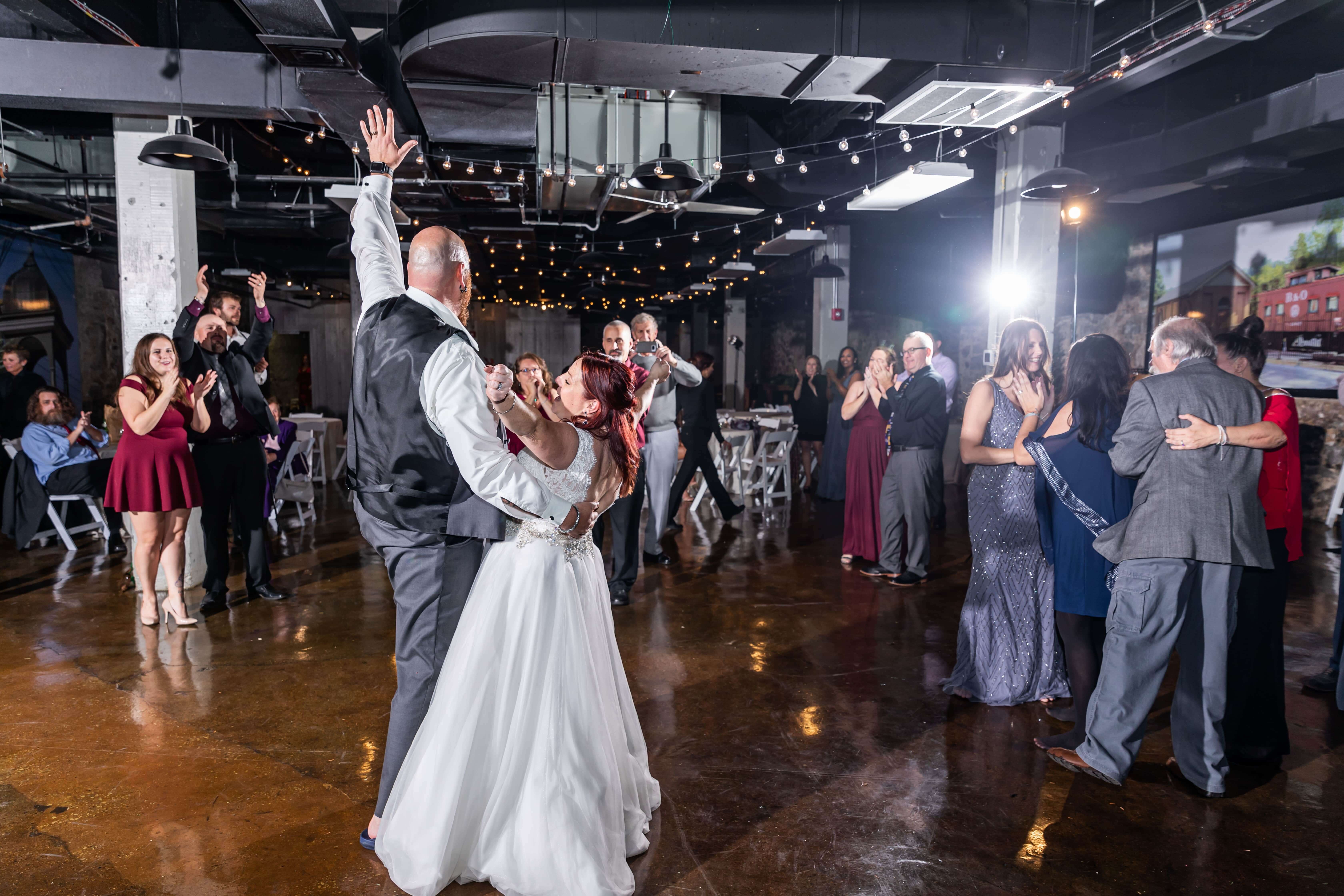 bride and groom partying with guests