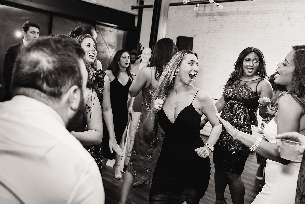 guests dance at wedding